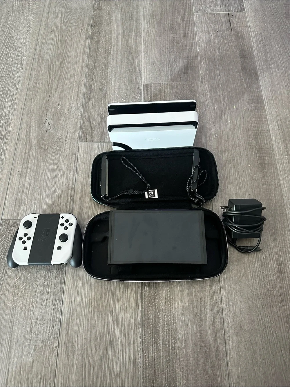 Nintendo Switch OLED Console with White Joy‑Con and Zelda Carry Case